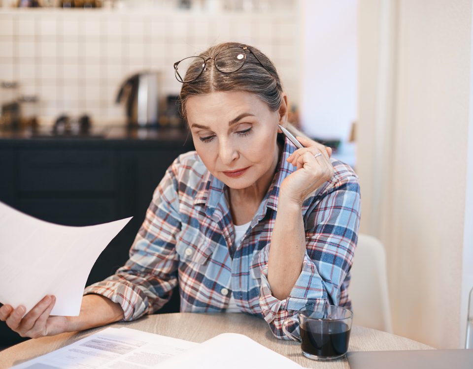 Woman sifting through paperwork