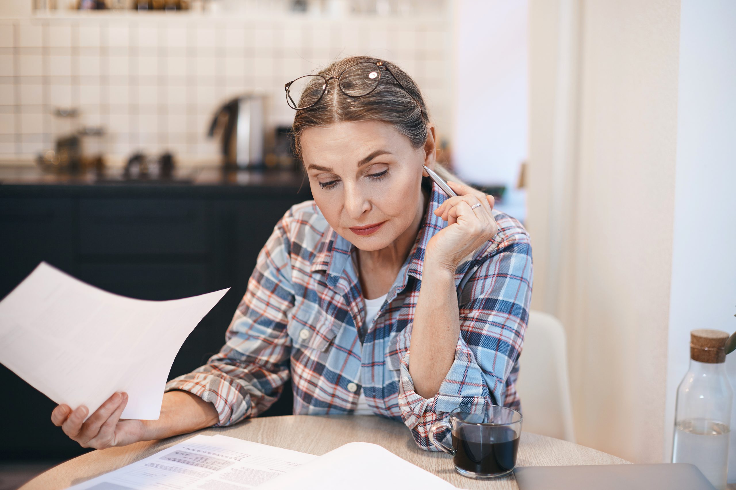 Woman sifting through paperwork