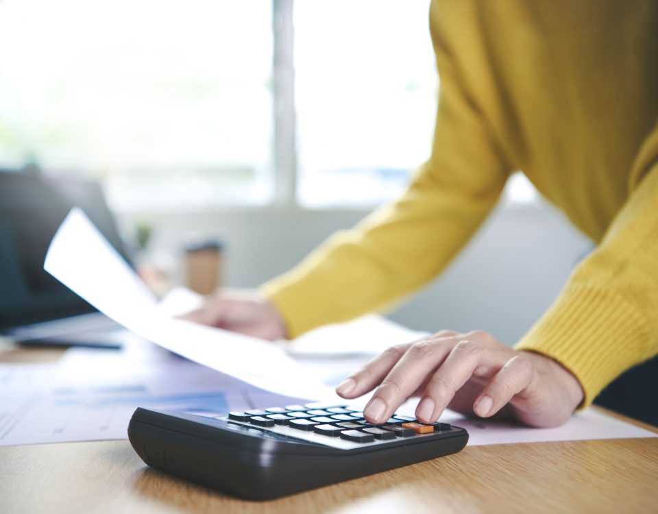 Woman calculating tax