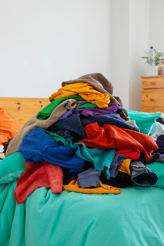 Vinted tax - clothes piled high
